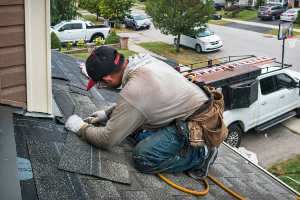 Professional Roofing technician working in Plumsteadville, PA